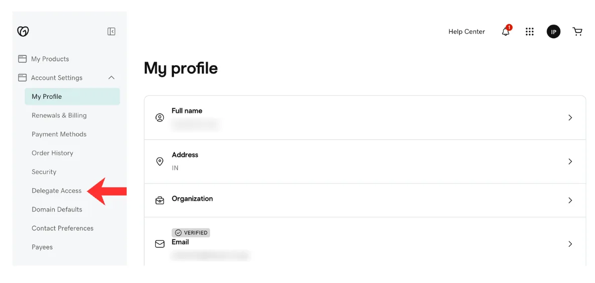 The GoDaddy My profile page with Delegate Access highlighted in the left column. Personal details are blurred.