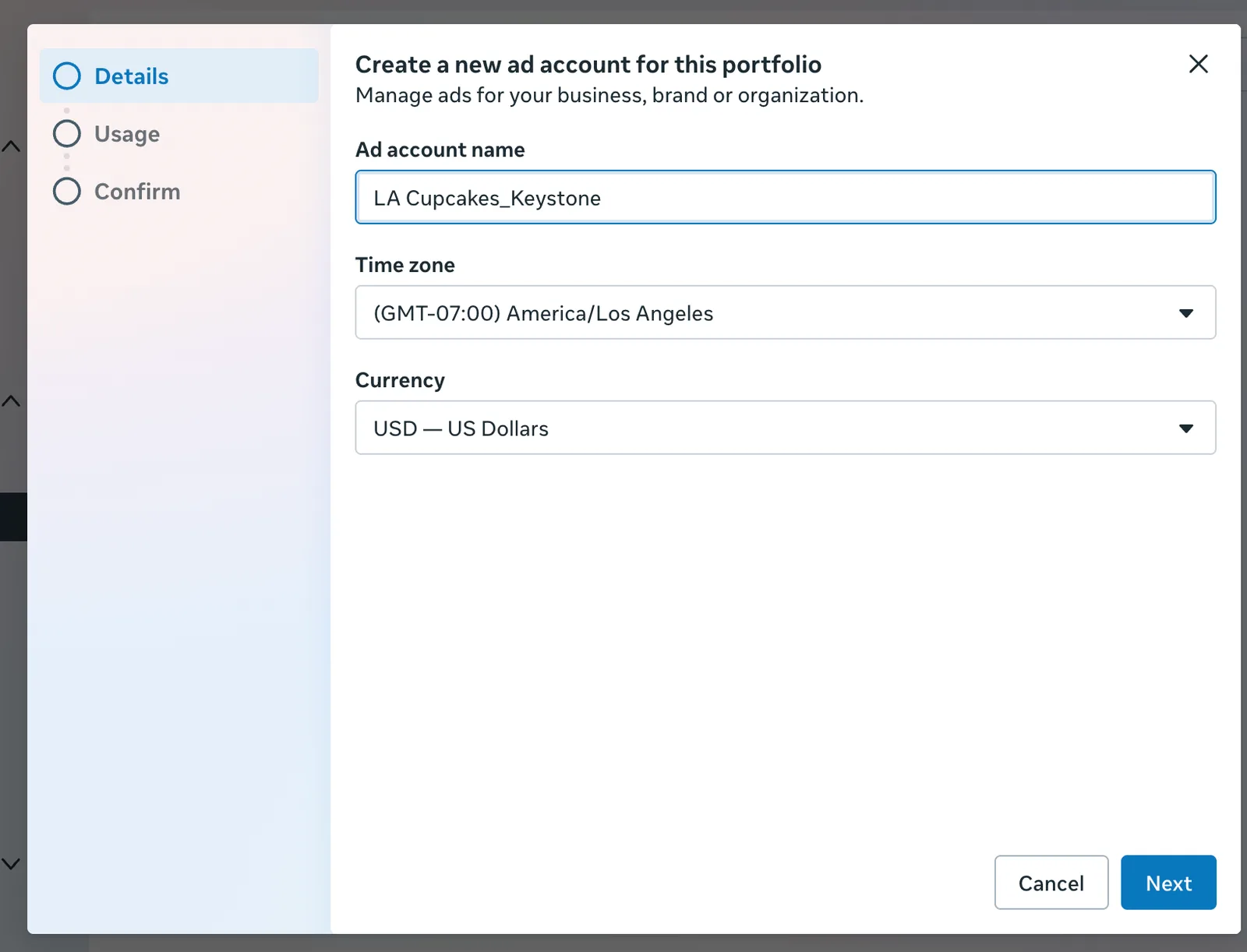 The Create a new ad account for this portfolio dialog with Ad account name LA Cupcakes_Keystone, a Time zone selector, a Currency selector, and Cancel and Next buttons.