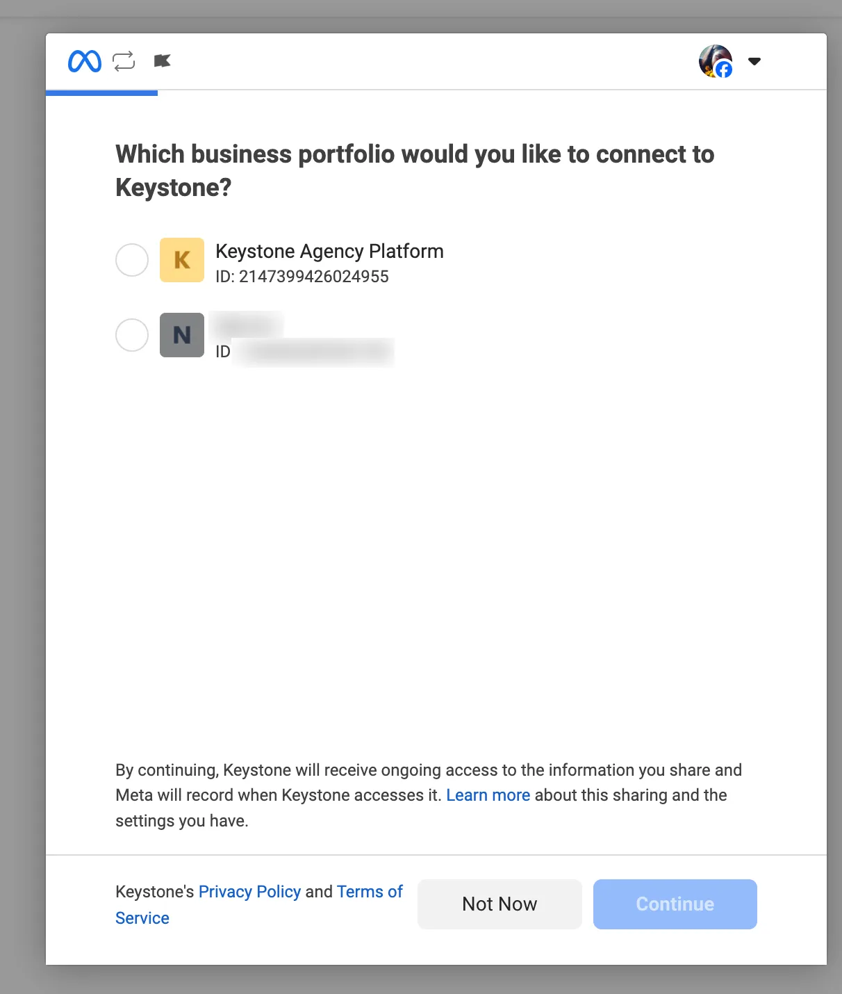 The Meta dialog Which business portfolio would you like to connect to Keystone? listing two portfolios with radio buttons, a note about ongoing access, and Not Now and Continue buttons. One portfolio name is blurred.