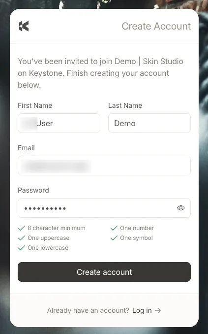 The Create Account page: the invited business named at the top, First Name and Last Name fields, an Email field already filled, a Password field with a checklist of five rules, and a Create account button.