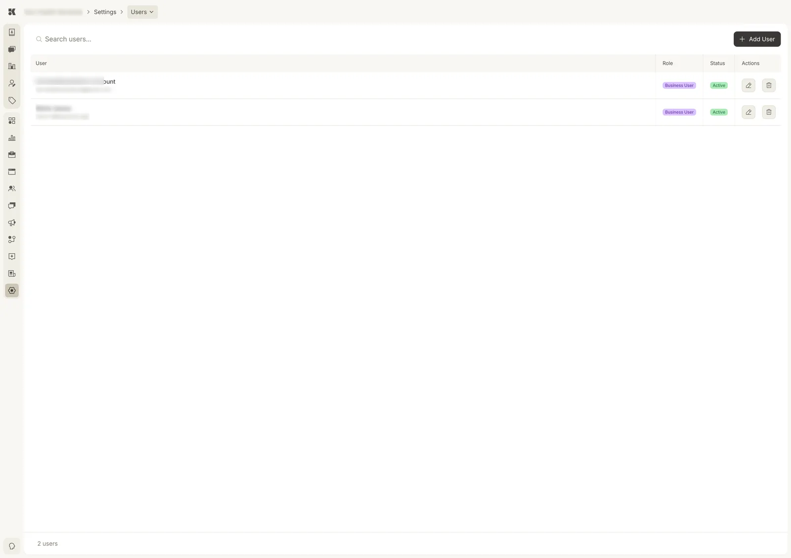The Users section: a search box, an Add User button, and a table with User (name and email), Role Business User, Status Active, and edit and delete actions for each of two users.